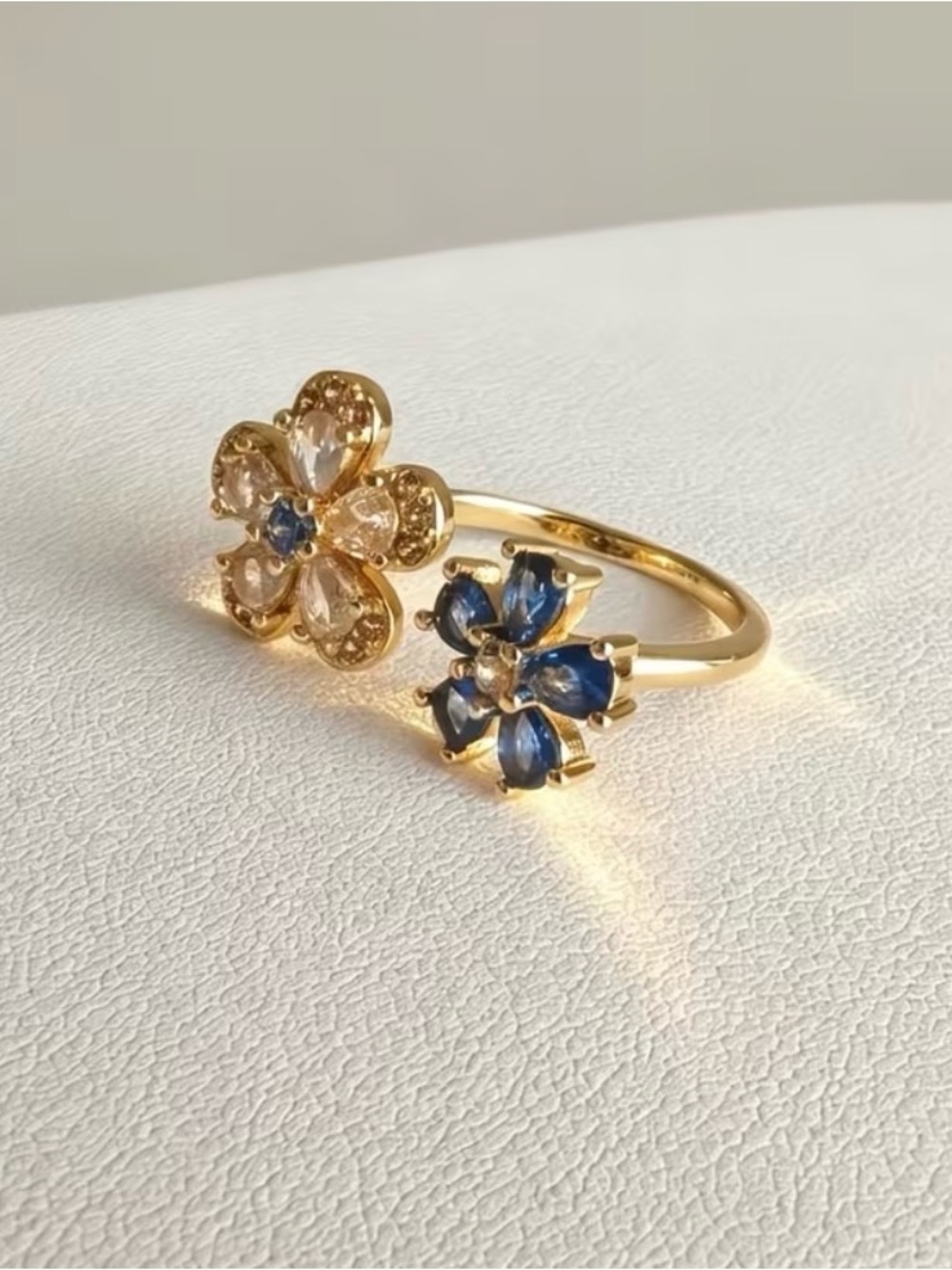 Gold Open Flower Ring with Blue and Clear Stones